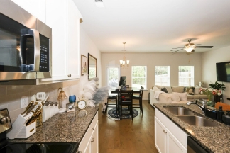 Unfurnished Townhome Wooded Backyard
