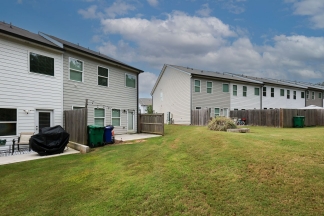 Unfurnished Townhome Wooded Backyard