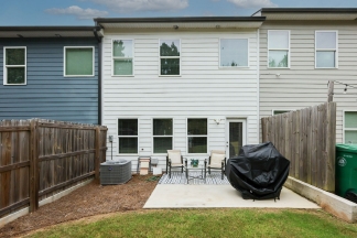 Unfurnished Townhome Wooded Backyard