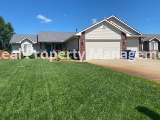 Beautiful  Home with 3 Car Garage and Fenced Yard
