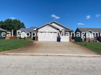 Beautiful  Home with 3 Car Garage and Fenced Yard