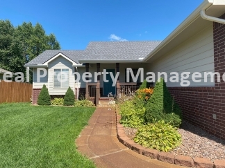 Beautiful  Home with 3 Car Garage and Fenced Yard