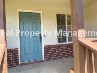 Beautiful  Home with 3 Car Garage and Fenced Yard