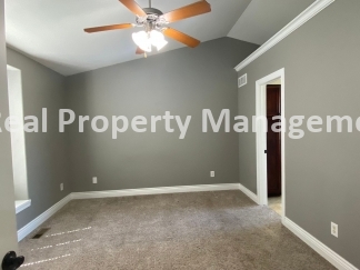 Beautiful  Home with 3 Car Garage and Fenced Yard