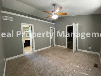 Beautiful  Home with 3 Car Garage and Fenced Yard