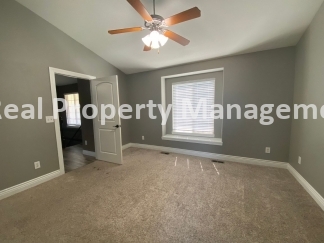 Beautiful  Home with 3 Car Garage and Fenced Yard