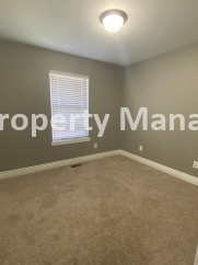 Beautiful  Home with 3 Car Garage and Fenced Yard