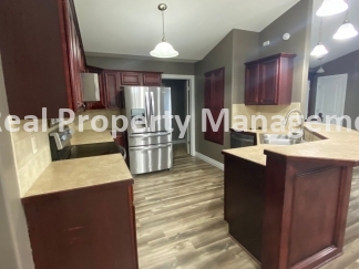 Beautiful  Home with 3 Car Garage and Fenced Yard