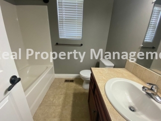 Beautiful  Home with 3 Car Garage and Fenced Yard