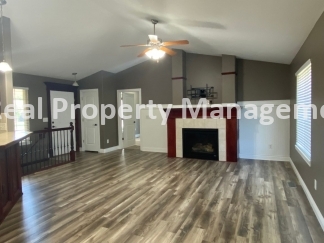 Beautiful  Home with 3 Car Garage and Fenced Yard