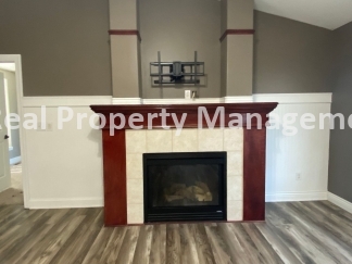 Beautiful  Home with 3 Car Garage and Fenced Yard