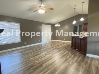 Beautiful  Home with 3 Car Garage and Fenced Yard