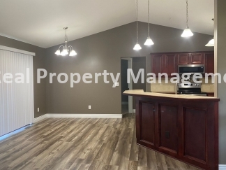 Beautiful  Home with 3 Car Garage and Fenced Yard