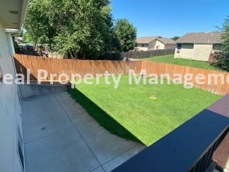 Beautiful  Home with 3 Car Garage and Fenced Yard