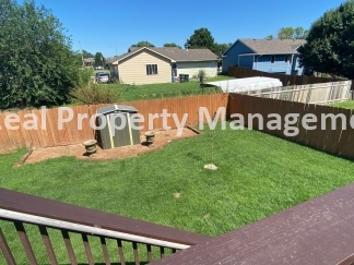 Beautiful  Home with 3 Car Garage and Fenced Yard