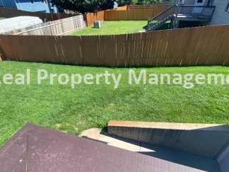 Beautiful  Home with 3 Car Garage and Fenced Yard