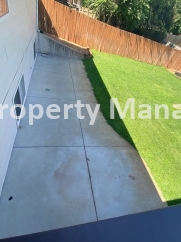 Beautiful  Home with 3 Car Garage and Fenced Yard