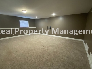 Beautiful  Home with 3 Car Garage and Fenced Yard