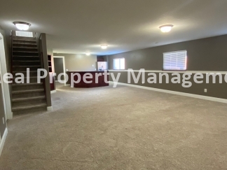 Beautiful  Home with 3 Car Garage and Fenced Yard