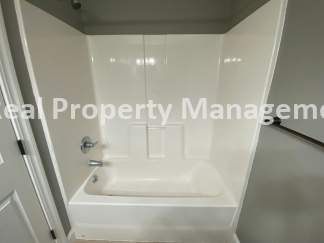 Beautiful  Home with 3 Car Garage and Fenced Yard