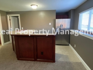 Beautiful  Home with 3 Car Garage and Fenced Yard