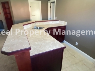 Beautiful  Home with 3 Car Garage and Fenced Yard