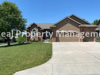 Beautiful Modern Home w/3 Car Garage, Fenced in Yard & Finished Basement