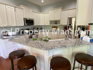 Beautiful Modern Home w/3 Car Garage, Fenced in Yard & Finished Basement