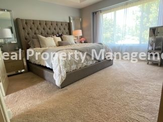 Beautiful Modern Home w/3 Car Garage, Fenced in Yard & Finished Basement