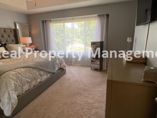 Beautiful Modern Home w/3 Car Garage, Fenced in Yard & Finished Basement