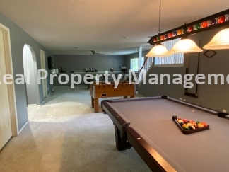 Beautiful Modern Home w/3 Car Garage, Fenced in Yard & Finished Basement