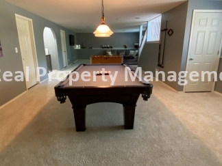Beautiful Modern Home w/3 Car Garage, Fenced in Yard & Finished Basement