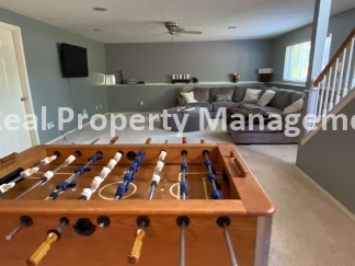 Beautiful Modern Home w/3 Car Garage, Fenced in Yard & Finished Basement