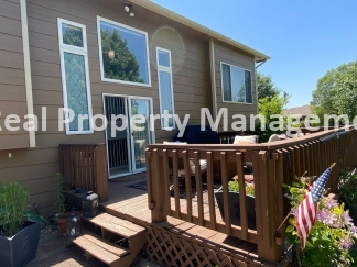 Beautiful Modern Home w/3 Car Garage, Fenced in Yard & Finished Basement