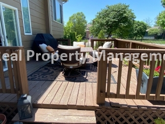 Beautiful Modern Home w/3 Car Garage, Fenced in Yard & Finished Basement