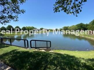 Beautiful Modern Home w/3 Car Garage, Fenced in Yard & Finished Basement