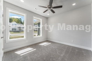 Modern Elegance: Spacious 4-Bedroom New Build with Private Back Porch
