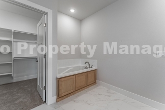 Modern Elegance: Spacious 4-Bedroom New Build with Private Back Porch
