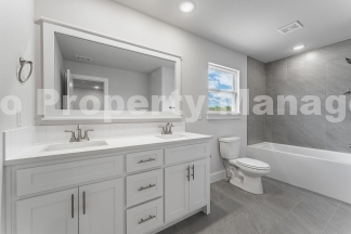 Modern Elegance: Spacious 4-Bedroom New Build with Private Back Porch