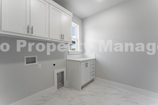 Modern Elegance: Spacious 4-Bedroom New Build with Private Back Porch