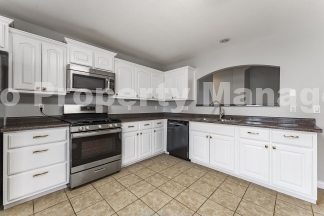 Bright & Spacious 4-Bedroom Home with Fenced Yard