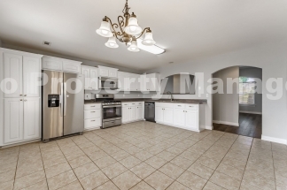 Bright & Spacious 4-Bedroom Home with Fenced Yard