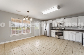 Bright & Spacious 4-Bedroom Home with Fenced Yard