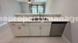 Stylish 3-Bed, 3-Bath Townhouse Oasis in Riviera Beach - 1311 Sq Ft of Comfort!