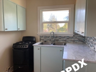 Freshly Updated 1 Bedroom with Reserved Parking In Vibrant SE PDX Neighborhood!