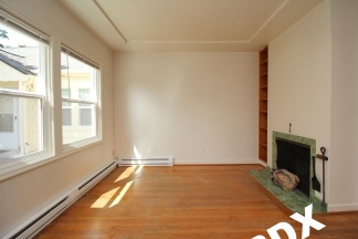 1 Bedroom Courtyard Apartment with Fireplace & Garage  – Blocks to OHSU!