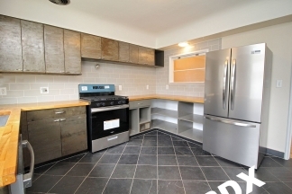 Spacious & Remodeled 2 Bed/1 Duplex Apartment with Mid-Century Flair