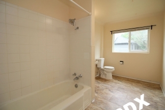 Spacious & Remodeled 2 Bed/1 Duplex Apartment with Mid-Century Flair