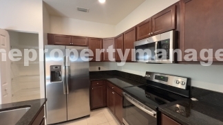 Spacious 3-Bedroom Townhouse with Gleaming Hardwood Floors in West Palm Beach!