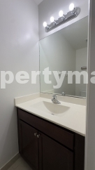 Spacious 3-Bedroom Townhouse with Gleaming Hardwood Floors in West Palm Beach!